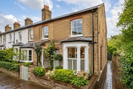 Victorian terrace near the village green with bright bay-fronted sitting room